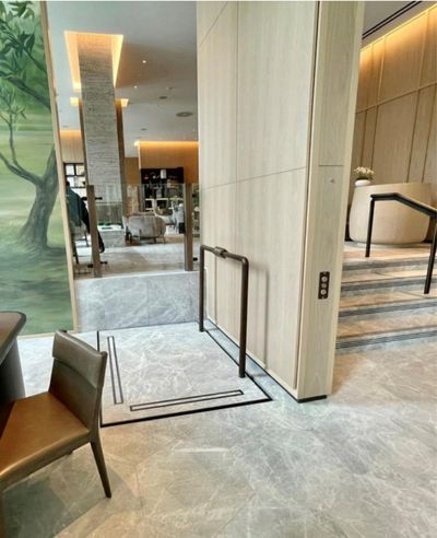A Lyfthaus platform lift in a hotel lobby